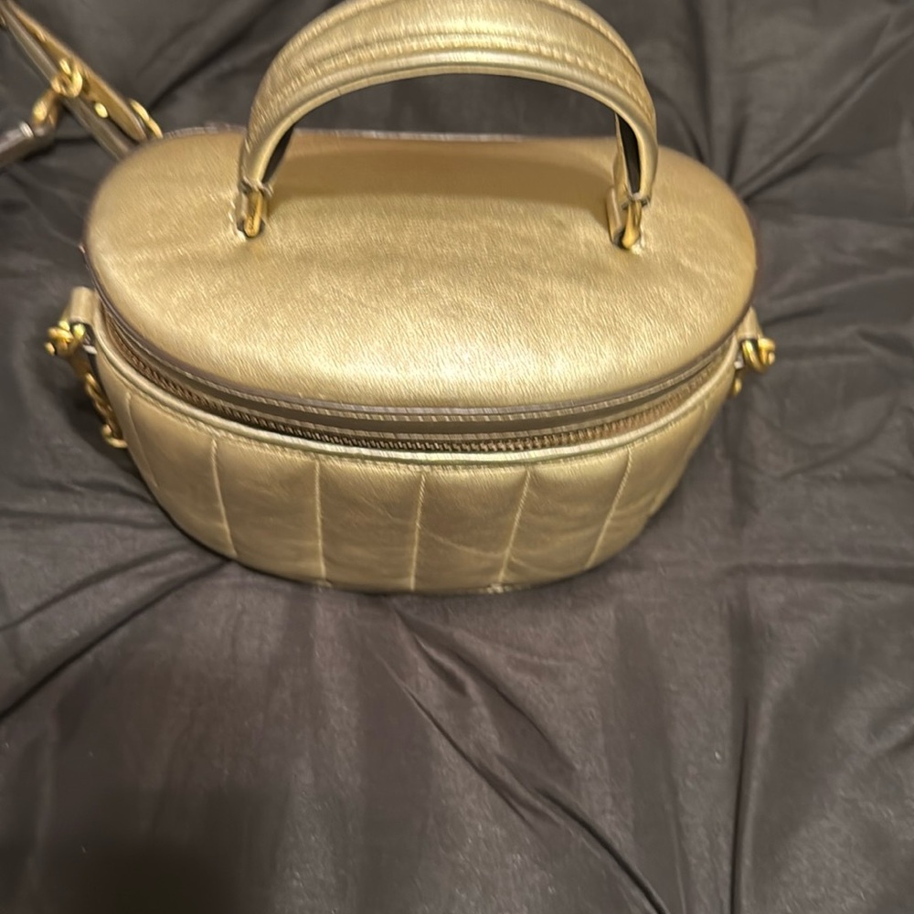 Gold coach crossbody